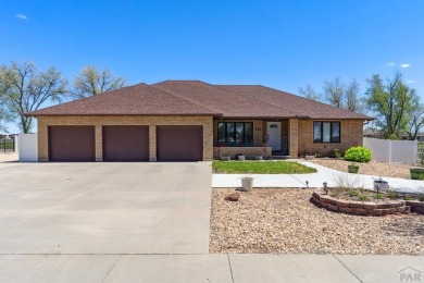 This beautifully updated rancher is a true gem--backing right up on Desert Hawk At Pueblo West in Colorado - for sale on GolfHomes.com, golf home, golf lot