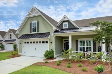 This lovely paired home just inside the main gate offers the on Savannah Quarters Country Club in Georgia - for sale on GolfHomes.com, golf home, golf lot