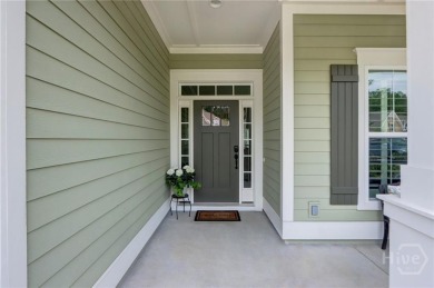 This lovely paired home just inside the main gate offers the on Savannah Quarters Country Club in Georgia - for sale on GolfHomes.com, golf home, golf lot