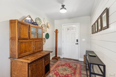 This beautifully updated rancher is a true gem--backing right up on Desert Hawk At Pueblo West in Colorado - for sale on GolfHomes.com, golf home, golf lot