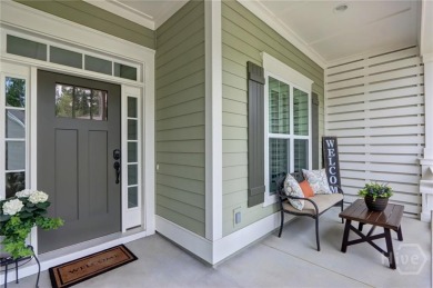 This lovely paired home just inside the main gate offers the on Savannah Quarters Country Club in Georgia - for sale on GolfHomes.com, golf home, golf lot