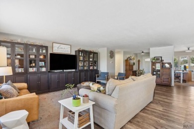 This beautifully updated rancher is a true gem--backing right up on Desert Hawk At Pueblo West in Colorado - for sale on GolfHomes.com, golf home, golf lot