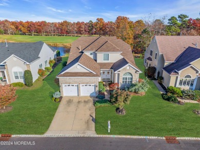 Extended Heritage model with full loft sits on a lakefront lot on Westlake Golf and Country Club in New Jersey - for sale on GolfHomes.com, golf home, golf lot