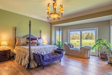 Nestled on a world-class golf course, this beautifully crafted on Prestwick Village Golf Club in Michigan - for sale on GolfHomes.com, golf home, golf lot