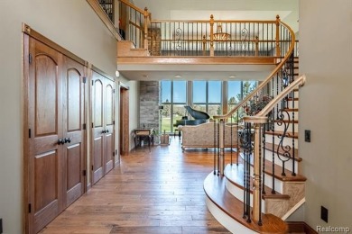 Nestled on a world-class golf course, this beautifully crafted on Prestwick Village Golf Club in Michigan - for sale on GolfHomes.com, golf home, golf lot