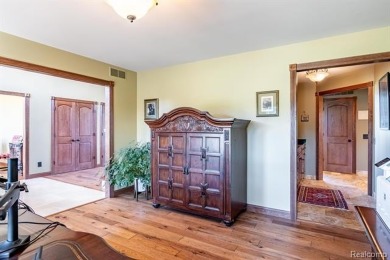 Nestled on a world-class golf course, this beautifully crafted on Prestwick Village Golf Club in Michigan - for sale on GolfHomes.com, golf home, golf lot