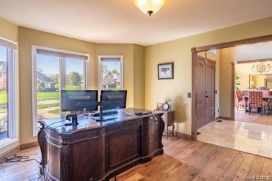 Nestled on a world-class golf course, this beautifully crafted on Prestwick Village Golf Club in Michigan - for sale on GolfHomes.com, golf home, golf lot
