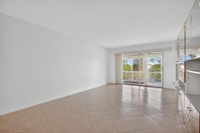 Location, Location, Location! This beautifully situated on Wynmoor Golf Course in Florida - for sale on GolfHomes.com, golf home, golf lot