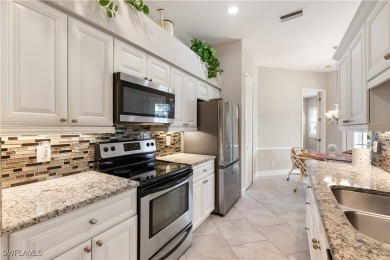 NEW ROOF, NEW AC, 3 GARAGE SPACES & accordion shutters on Herons Glen Golf and Country Club in Florida - for sale on GolfHomes.com, golf home, golf lot