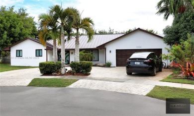 Nestled on a private cul-de-sac, this stunning villa offers the on The Club at Emerald Hills in Florida - for sale on GolfHomes.com, golf home, golf lot