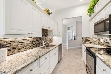 NEW ROOF, NEW AC, 3 GARAGE SPACES & accordion shutters on Herons Glen Golf and Country Club in Florida - for sale on GolfHomes.com, golf home, golf lot