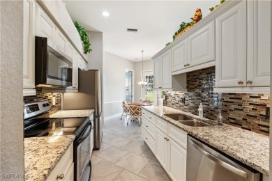 NEW ROOF, NEW AC, 3 GARAGE SPACES & accordion shutters on Herons Glen Golf and Country Club in Florida - for sale on GolfHomes.com, golf home, golf lot