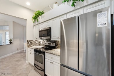 NEW ROOF, NEW AC, 3 GARAGE SPACES & accordion shutters on Herons Glen Golf and Country Club in Florida - for sale on GolfHomes.com, golf home, golf lot