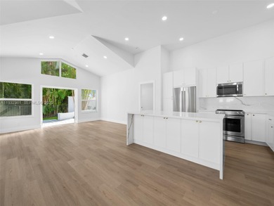 Fully renovated 3-bedroom, 3-bathroom residence in the highly on Broken Sound Golf and Club  in Florida - for sale on GolfHomes.com, golf home, golf lot