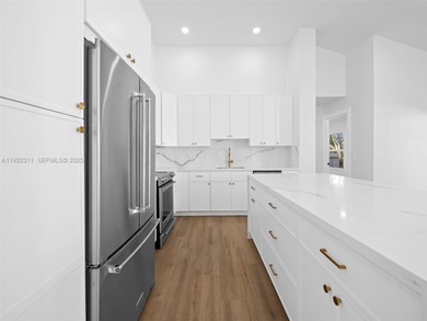 Fully renovated 3-bedroom, 3-bathroom residence in the highly on Broken Sound Golf and Club  in Florida - for sale on GolfHomes.com, golf home, golf lot