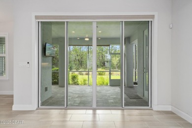 Enjoy peaceful water and wooded views in this beautifully on Venetian Bay Golf Course in Florida - for sale on GolfHomes.com, golf home, golf lot
