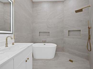 Fully renovated 3-bedroom, 3-bathroom residence in the highly on Broken Sound Golf and Club  in Florida - for sale on GolfHomes.com, golf home, golf lot