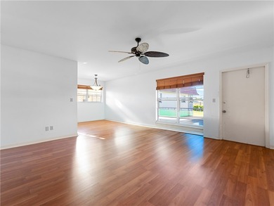 RARE NON-AGE-RESTRICTED BUILDING in Vista Royale! Step into this on The American Golf Club in Florida - for sale on GolfHomes.com, golf home, golf lot