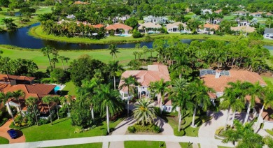 Nestled on nearly a half acre estate lot with picturesque sunset on Breakers Rees Jones Course in Florida - for sale on GolfHomes.com, golf home, golf lot