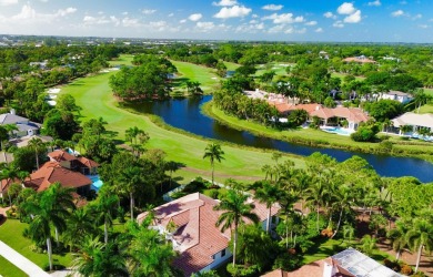 Nestled on nearly a half acre estate lot with picturesque sunset on Breakers Rees Jones Course in Florida - for sale on GolfHomes.com, golf home, golf lot