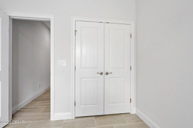 Enjoy peaceful water and wooded views in this beautifully on Venetian Bay Golf Course in Florida - for sale on GolfHomes.com, golf home, golf lot