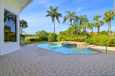 Nestled on nearly a half acre estate lot with picturesque sunset on Breakers Rees Jones Course in Florida - for sale on GolfHomes.com, golf home, golf lot