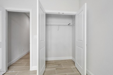 Enjoy peaceful water and wooded views in this beautifully on Venetian Bay Golf Course in Florida - for sale on GolfHomes.com, golf home, golf lot