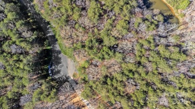 Don't miss this opportunity to build your dream home on this on Old North State Club at Uwharrie Point Golf community in North Carolina - for sale on GolfHomes.com, golf home, golf lot