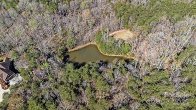 Don't miss this opportunity to build your dream home on this on Old North State Club at Uwharrie Point Golf community in North Carolina - for sale on GolfHomes.com, golf home, golf lot