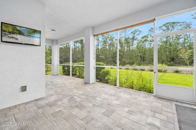 Enjoy peaceful water and wooded views in this beautifully on Venetian Bay Golf Course in Florida - for sale on GolfHomes.com, golf home, golf lot