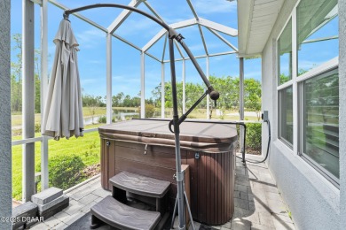 Enjoy peaceful water and wooded views in this beautifully on Venetian Bay Golf Course in Florida - for sale on GolfHomes.com, golf home, golf lot