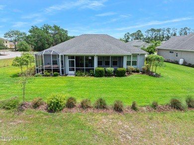 Enjoy peaceful water and wooded views in this beautifully on Venetian Bay Golf Course in Florida - for sale on GolfHomes.com, golf home, golf lot