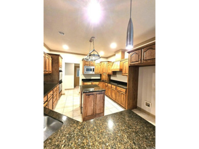 Nice all-brick home with vinyl accents located on Magellan Golf on Magellan Golf Course in Arkansas - for sale on GolfHomes.com, golf home, golf lot