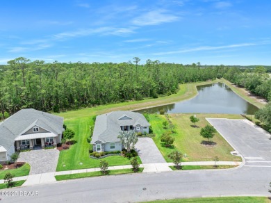 Enjoy peaceful water and wooded views in this beautifully on Venetian Bay Golf Course in Florida - for sale on GolfHomes.com, golf home, golf lot