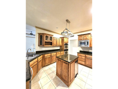 Nice all-brick home with vinyl accents located on Magellan Golf on Magellan Golf Course in Arkansas - for sale on GolfHomes.com, golf home, golf lot