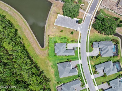 Enjoy peaceful water and wooded views in this beautifully on Venetian Bay Golf Course in Florida - for sale on GolfHomes.com, golf home, golf lot