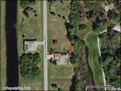 A cleared residential building lot backing up to the 1st Tee Box on Rotonda Golf and Country Club - Long Marsh  in Florida - for sale on GolfHomes.com, golf home, golf lot