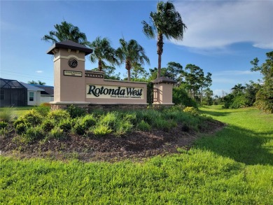 A cleared residential building lot backing up to the 1st Tee Box on Rotonda Golf and Country Club - Long Marsh  in Florida - for sale on GolfHomes.com, golf home, golf lot