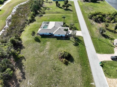 A cleared residential building lot backing up to the 1st Tee Box on Rotonda Golf and Country Club - Long Marsh  in Florida - for sale on GolfHomes.com, golf home, golf lot