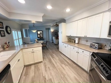 MOTIVATED SELLER! MUST SEE! This lovely, renovated Stucco home on Del Tura Golf and Country Club in Florida - for sale on GolfHomes.com, golf home, golf lot