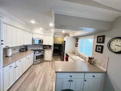 MOTIVATED SELLER! MUST SEE! This lovely, renovated Stucco home on Del Tura Golf and Country Club in Florida - for sale on GolfHomes.com, golf home, golf lot