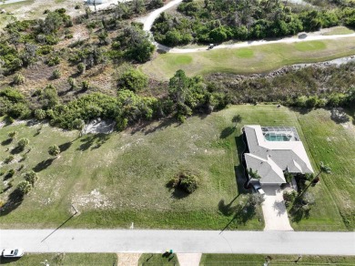 A cleared residential building lot backing up to the 1st Tee Box on Rotonda Golf and Country Club - Long Marsh  in Florida - for sale on GolfHomes.com, golf home, golf lot