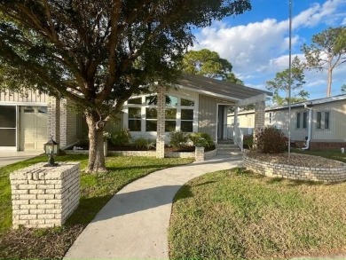 Absolutely stunning 2-bd, 2-ba home with modern updates & a on Del Tura Golf and Country Club in Florida - for sale on GolfHomes.com, golf home, golf lot