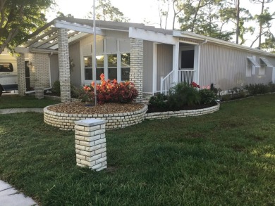 Absolutely stunning 2-bd, 2-ba home with modern updates & a on Del Tura Golf and Country Club in Florida - for sale on GolfHomes.com, golf home, golf lot