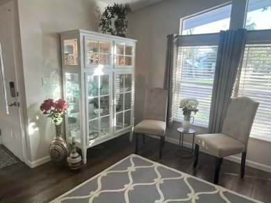 Absolutely stunning 2-bd, 2-ba home with modern updates & a on Del Tura Golf and Country Club in Florida - for sale on GolfHomes.com, golf home, golf lot