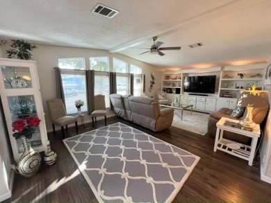 Absolutely stunning 2-bd, 2-ba home with modern updates & a on Del Tura Golf and Country Club in Florida - for sale on GolfHomes.com, golf home, golf lot