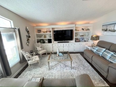 Absolutely stunning 2-bd, 2-ba home with modern updates & a on Del Tura Golf and Country Club in Florida - for sale on GolfHomes.com, golf home, golf lot