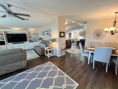 Absolutely stunning 2-bd, 2-ba home with modern updates & a on Del Tura Golf and Country Club in Florida - for sale on GolfHomes.com, golf home, golf lot