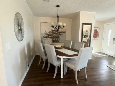 Absolutely stunning 2-bd, 2-ba home with modern updates & a on Del Tura Golf and Country Club in Florida - for sale on GolfHomes.com, golf home, golf lot