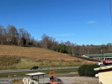 Conveniently located between Hayesville, NC, and Hiawassee, GA on Chatuge Shores Golf Course in North Carolina - for sale on GolfHomes.com, golf home, golf lot